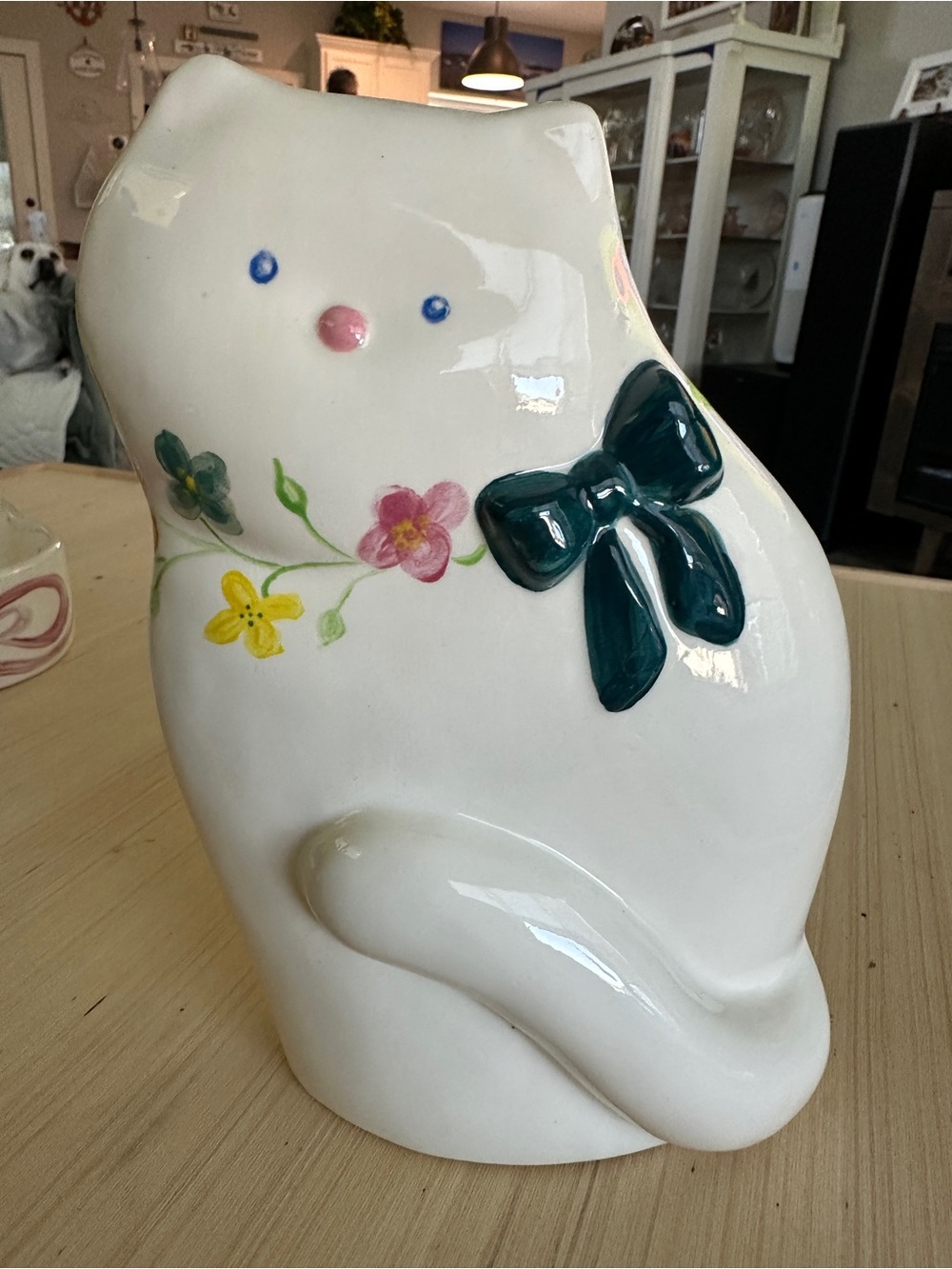 Signed White Ceramic Cat Figurine with Green Bow and Floral Accents